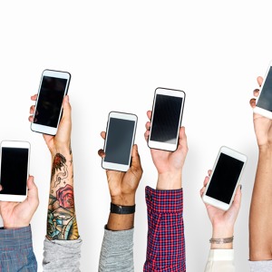 hand-holding-mobile-phones-isolated.jpg